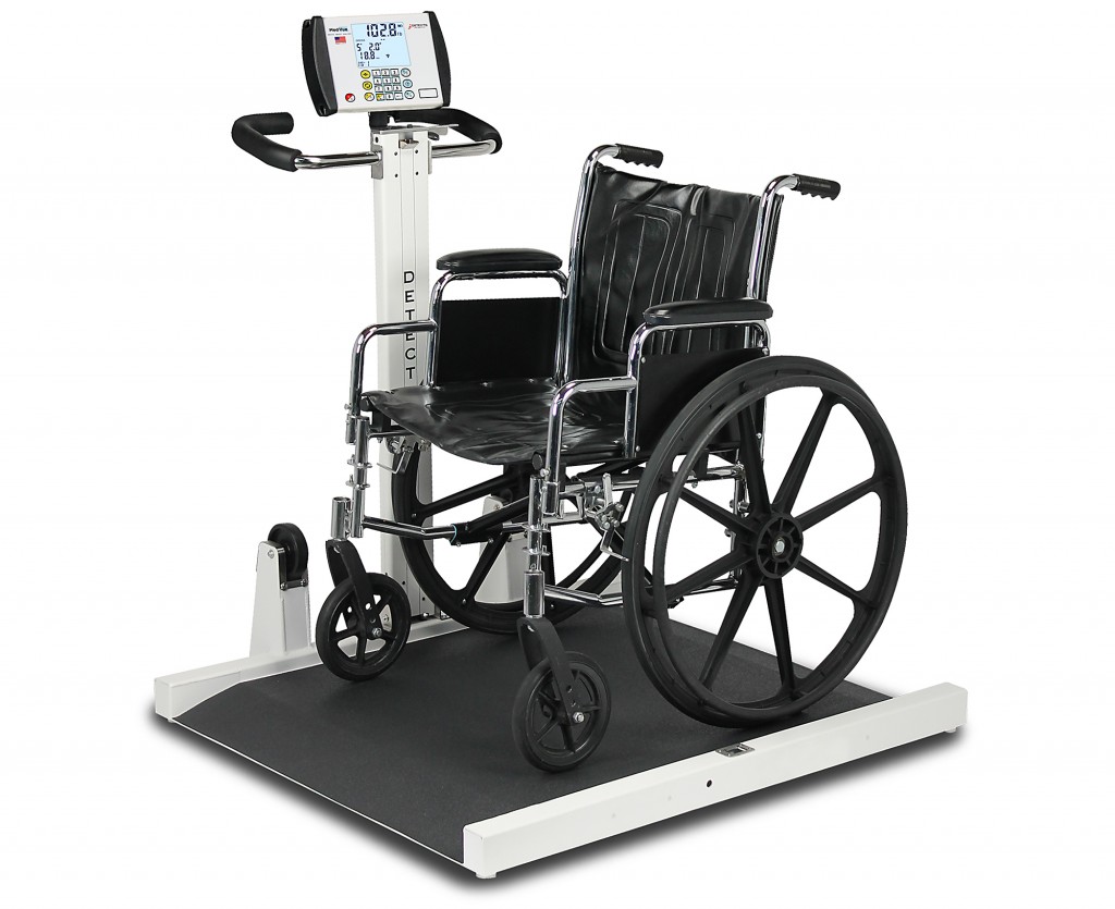 A wheelchair sitting on a portable wheelchair scale