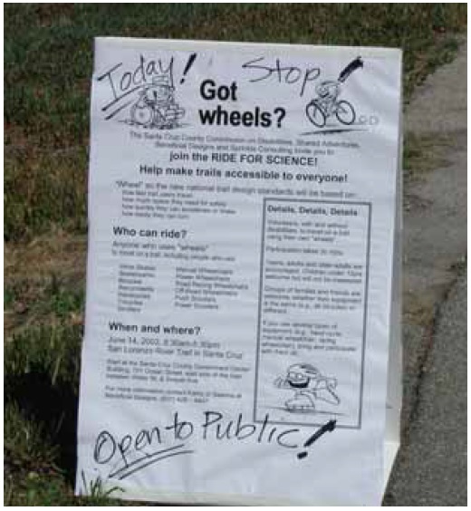 Figure 21: Photo. Trail user intercept signage. Signs were placed on the trails to intercept trail users and encourage them to participate in the data collection events. The sign shown in this photo invites trail users to participate and provides information about who can ride, when and where, and details.