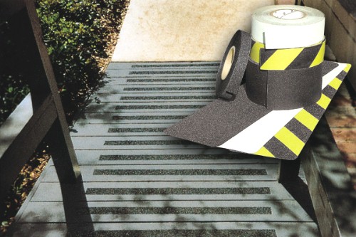 Anti-slip adhesive tape applied to walking surface