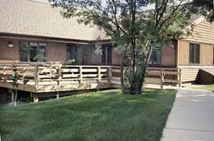 Photo of an accessible deck entrance to building
