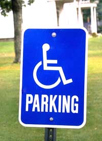 Photo of an accessible parking area sign