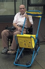 man with evacuation chair