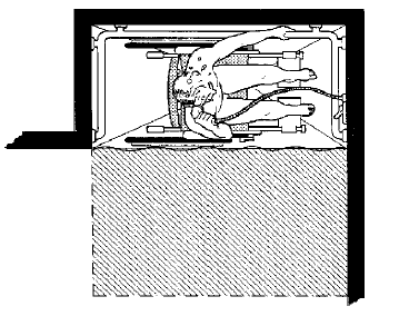Illustration showing a person using a wheelchair in a roll-in shower that is not equipped with a fold-down seat.