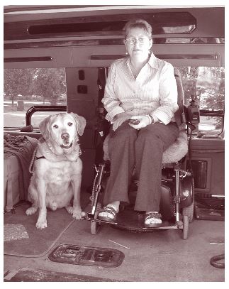 photo of Betty Barnett pictured with Kirk, her service animal