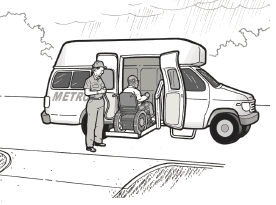 A man using a wheelchair enters a paratransit van provided so he can evacuate from his home.