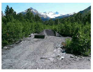 Trail crew installs Glacial moraine and geotextile fabric.
