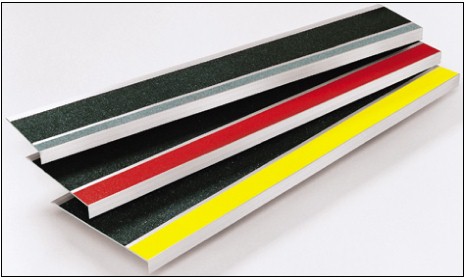 Stair tread surface in black, red, and yellow