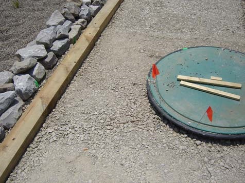 Klingstone base prepared around manhole cover.