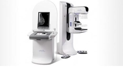 Mammography system with a height adjustable breast plate