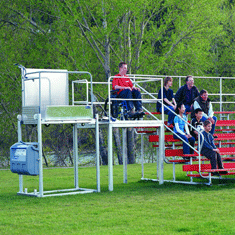Wheelchair lift used at exterior bleachers