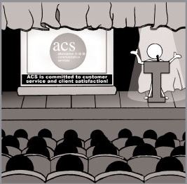 Stick figure person stands at a podium on a stage in front of an audience while a screen on the stage captions the speaker's words