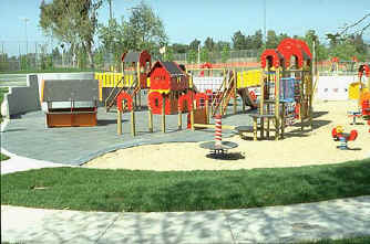 photo of play area with accessible and inaccessible surfaces